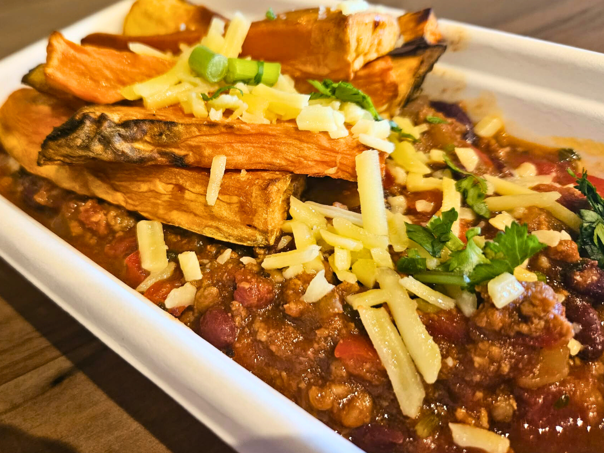 Chili con carne with sweet potato dippers
