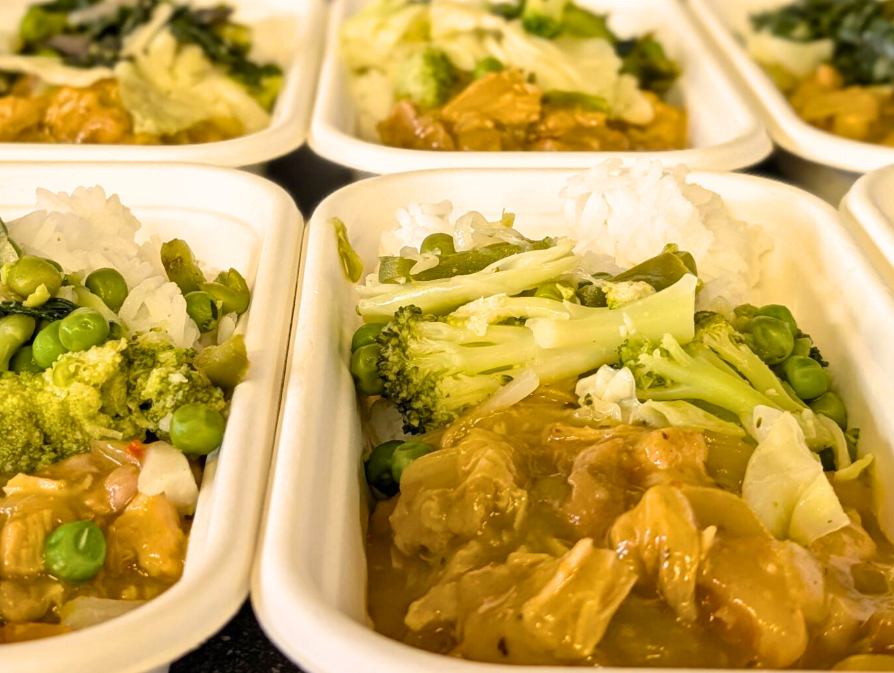 Apricot chicken with rice and a side of wilted greens