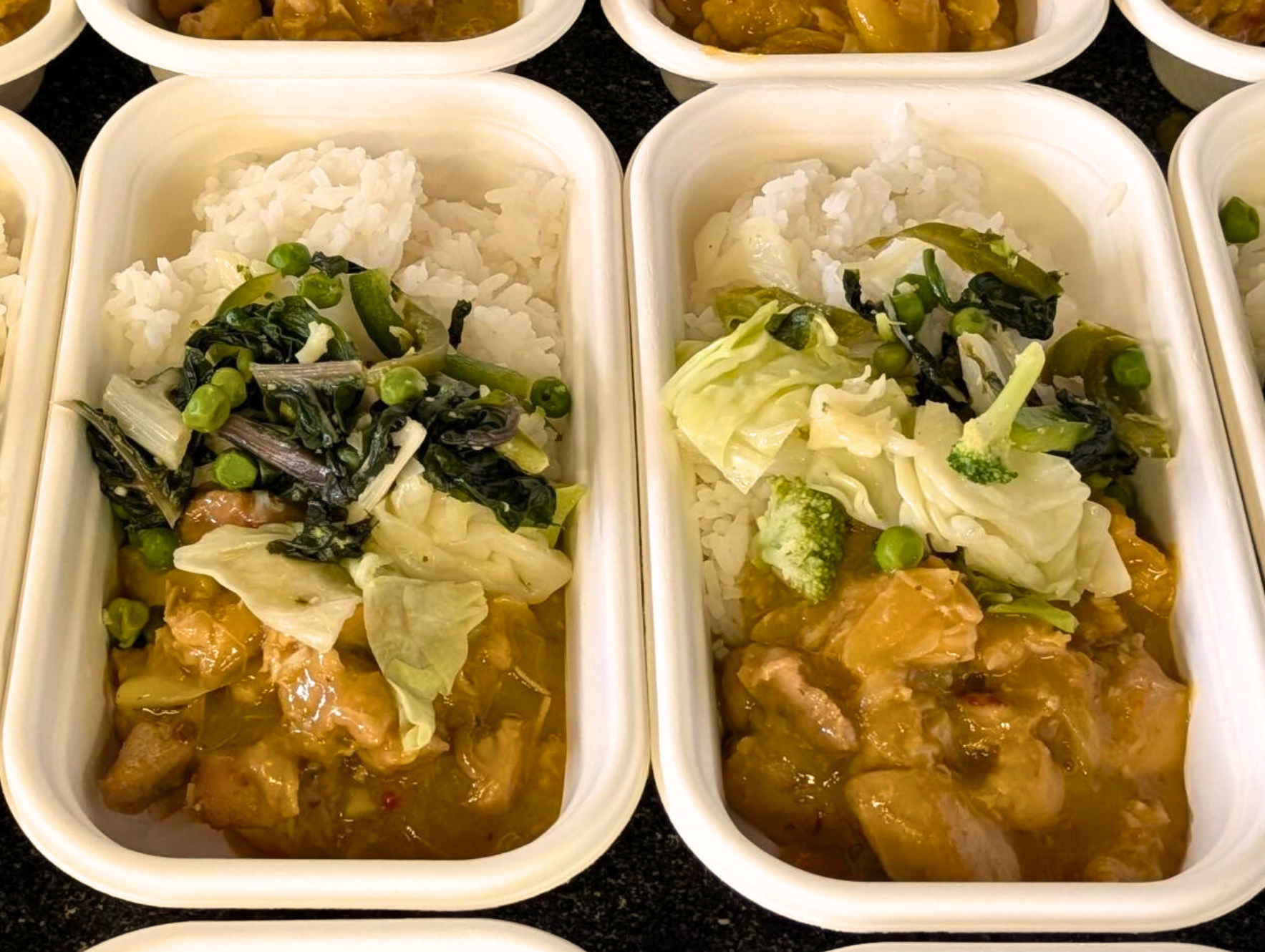 Apricot chicken with rice and a side of wilted greens