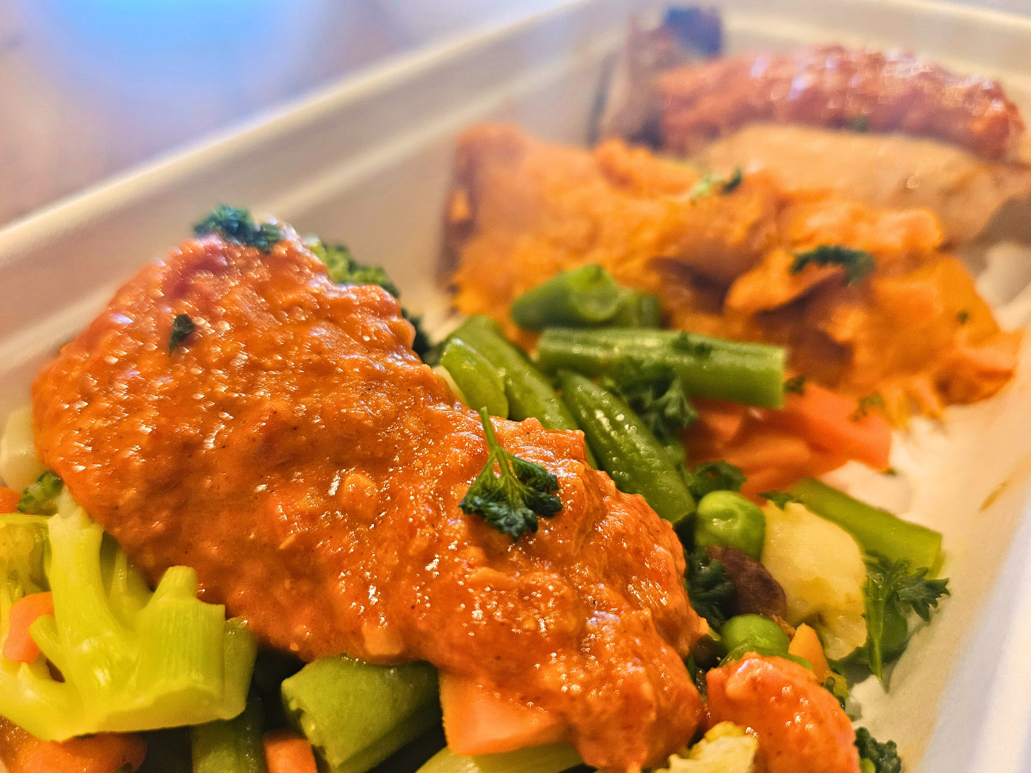 Medium sized Portuguese Chicken with Peri Peri Fusion Sauce sided with a sweet potato mash